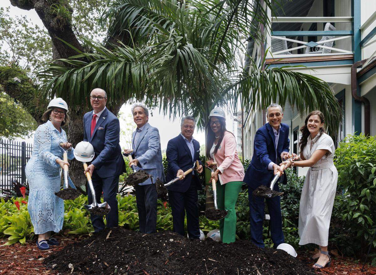 Florida state Rep. Chip LaMarca and Florida Sen. Rosalind Osgood, center, along with Jennifer Belt, Executive Director of the Stranahan House, right, and Fort Lauderdale City Commissioners lift their shovels during a groundbreaking ceremony at the Historic Stranahan House Museum on Wednesday, Sept. 17, 2025. The Stranahan House is the oldest surviving building in Broward County and will undergo a $3 million expansion.