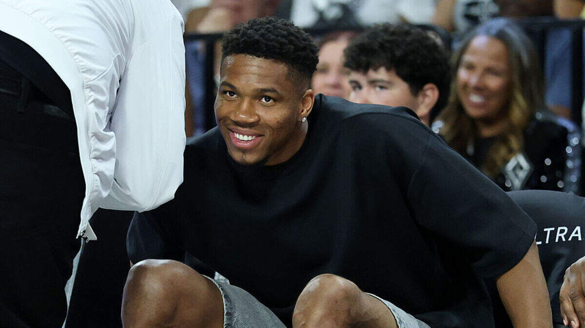 NBA player Giannis Antetokounmpo of the Miami Heat is greeted as he attends a game between the New York Liberty and the Las Vegas Aces at Michelob ULTRA Arena on June 23, 2026 in Las Vegas, Nevada.
