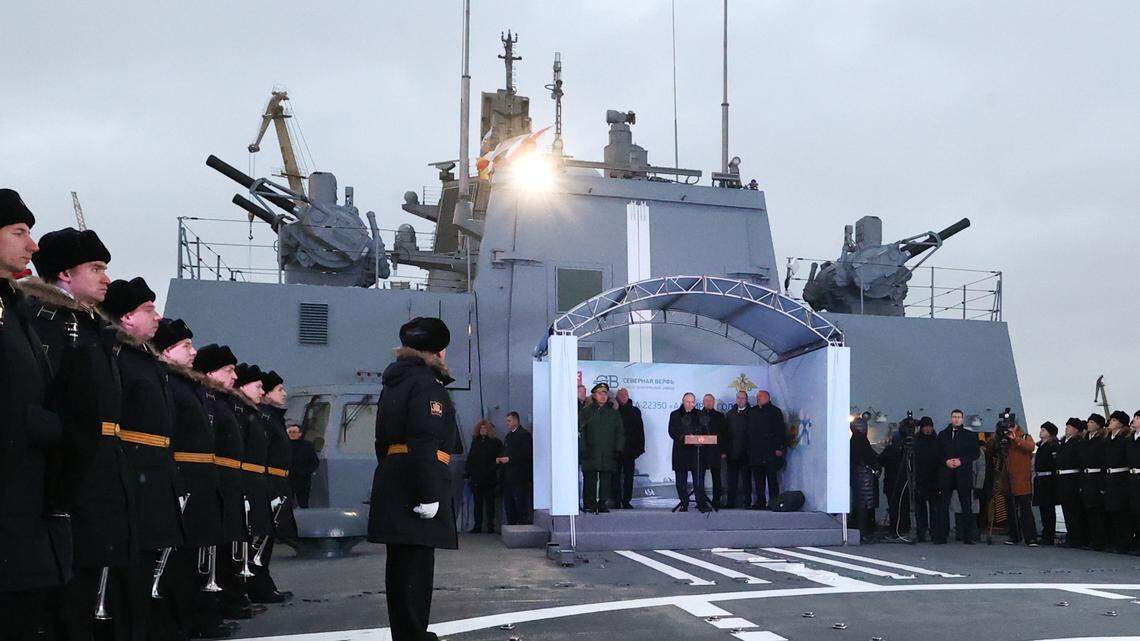 RUSSIA, ST PETERSBURG - DECEMBER 25, 2023: Russia’s President Vladimir Putin (C) attends a ceremony to raise a Russian naval ensign at the Admiral Golovko frigate as the ship joins the Russian Northern Fleet, at the Severnaya Verf shipyard. Sergei Karpukhin/TASS/Sipa USA