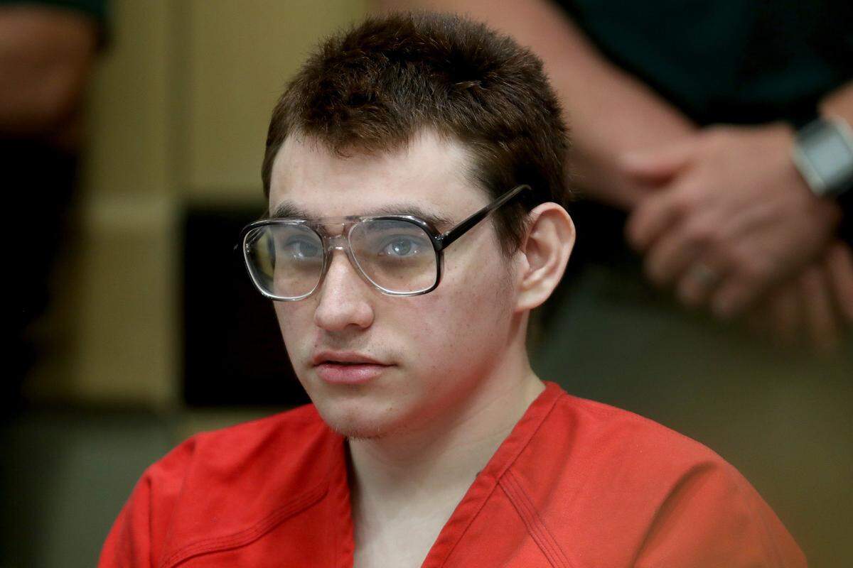 Parkland school shooter Nikolas Cruz sits at the defense table during a status hearing at the Broward Courthouse in Fort Lauderdale on Thursday, Feb. 21, 2019.