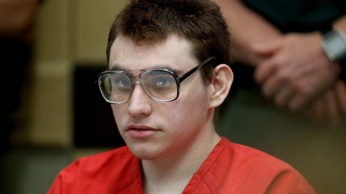 Parkland school shooter Nikolas Cruz sits at the defense table during a status hearing at the Broward Courthouse in Fort Lauderdale on Thursday, Feb. 21, 2019.