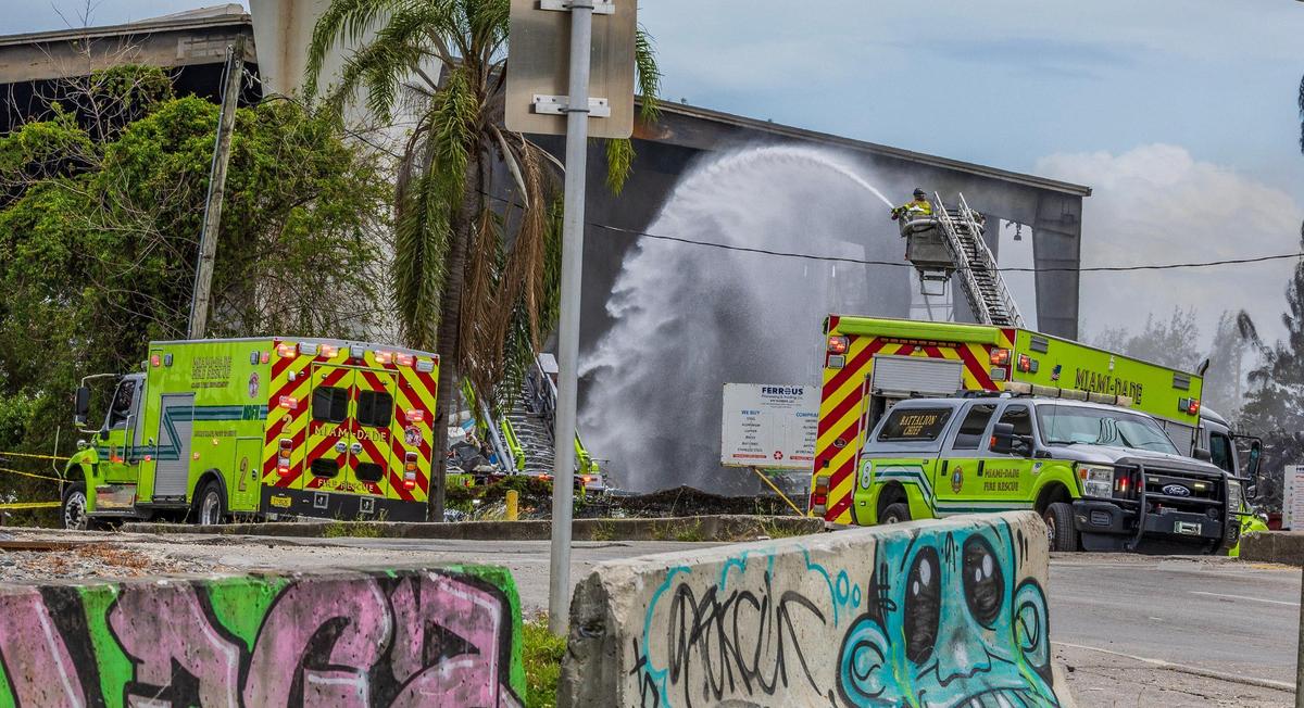 Several Miami-Dade Firefighters units battled a large fire at the Ferrous Processing and Trading scrap metal facility located at 3700 NW North River Drive, in Miami, on Thursday April 10, 2025.