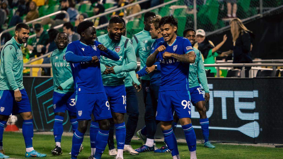 Miami FC players celebrate a 1-0 road win against the Tampa Bay Rowdies on April 9, 2022. The teams meet again in the USL Championship playoffs on Oct. 22, 2022.