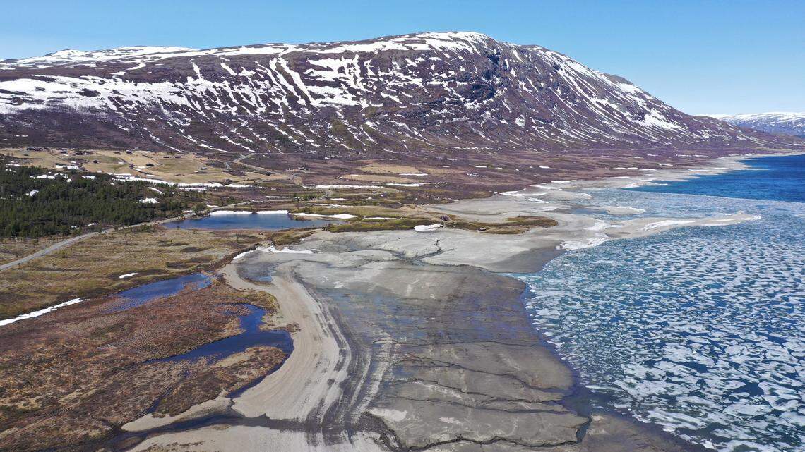 Archaeologists excavated 7,000-year-old wooden fish traps at Tesse lake for the first time after a hiker stumbled on the ruins, photos show.