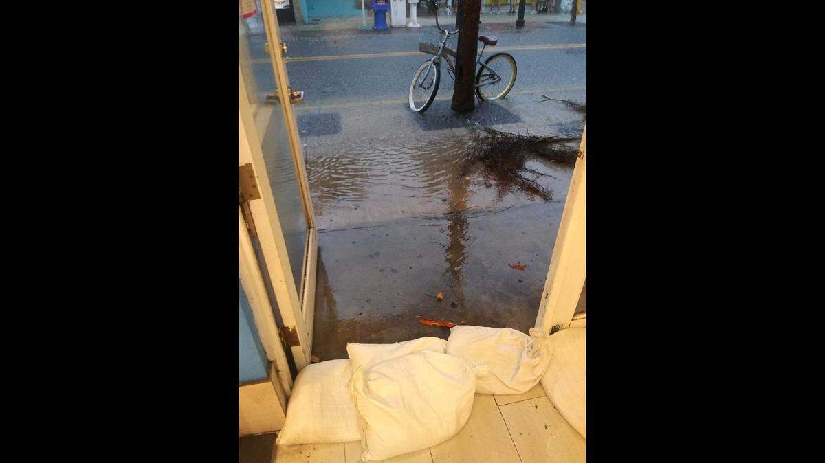 A candy shop in the 100 block of Duval Street tried to fend off the water with sandbags. Some employees had to bike home in water that became waist-high at some points, they said.