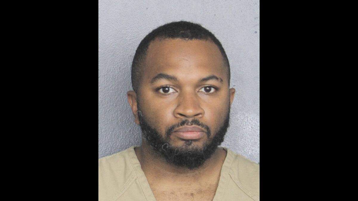 Miramar officer George Richardson was fired after he was arrested on charges related to coercing a child to perform sex acts, records show.