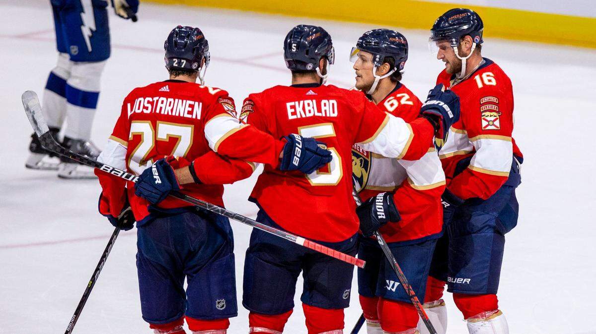 Florida Panthers players react after a goal by Brandon Montour (62) during a NHL preseason game against the Tampa Bay Lightning at FLA Live Arena in Sunrise, Florida, on Thursday, October 6, 2022.