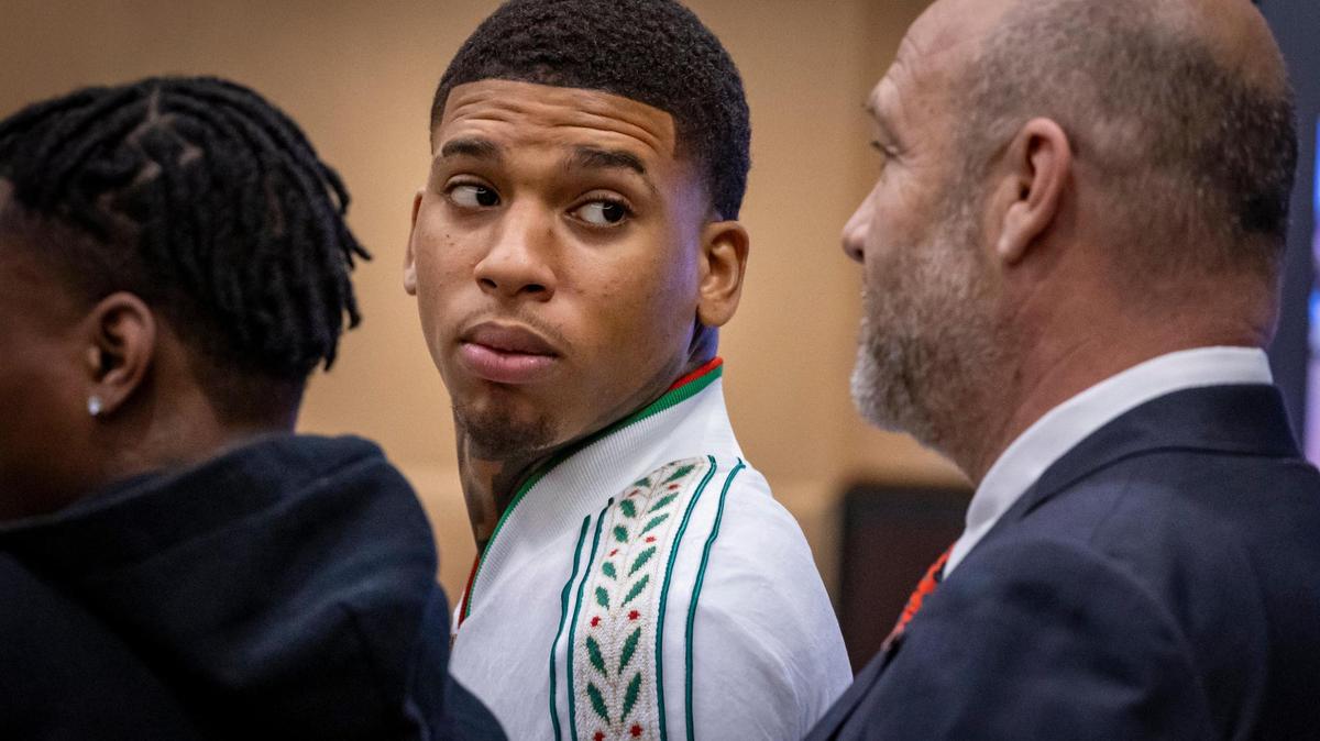 Fort Lauderdale, Florida, December 8, 2023 - Rapper NLE Choppa, whose real name is Bryson Potts, center, along with his attorney, Brad Cohen, right, and a co-defendant in the case, left, before Judge Barbara Duffy in courtroom 6900 at the Broward County Courthouse in Fort Lauderdale, Florida