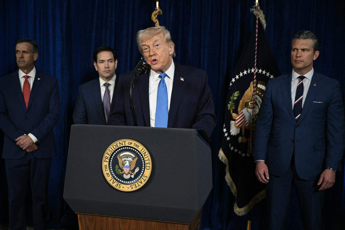 US President Donald Trump, alongside (L/R), CIA Director John Ratcliffe, Secretary of State Marco Rubio and Secretary of Defense Pete Hegseth, speaks to the press following US military actions in Venezuela, at his Mar-a-Lago residence in Palm Beach, Florida, on January 3, 2026. President Trump said Saturday that US forces had captured Venezuelan leader Nicolas Maduro after launching a "large scale strike" on the South American country. (Photo by Jim WATSON / AFP via Getty Images)