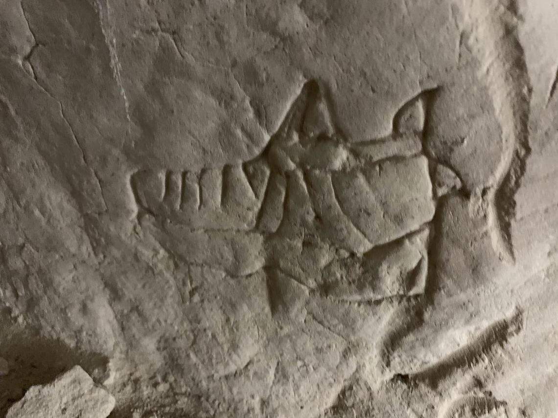 Another carving on the cave wall.