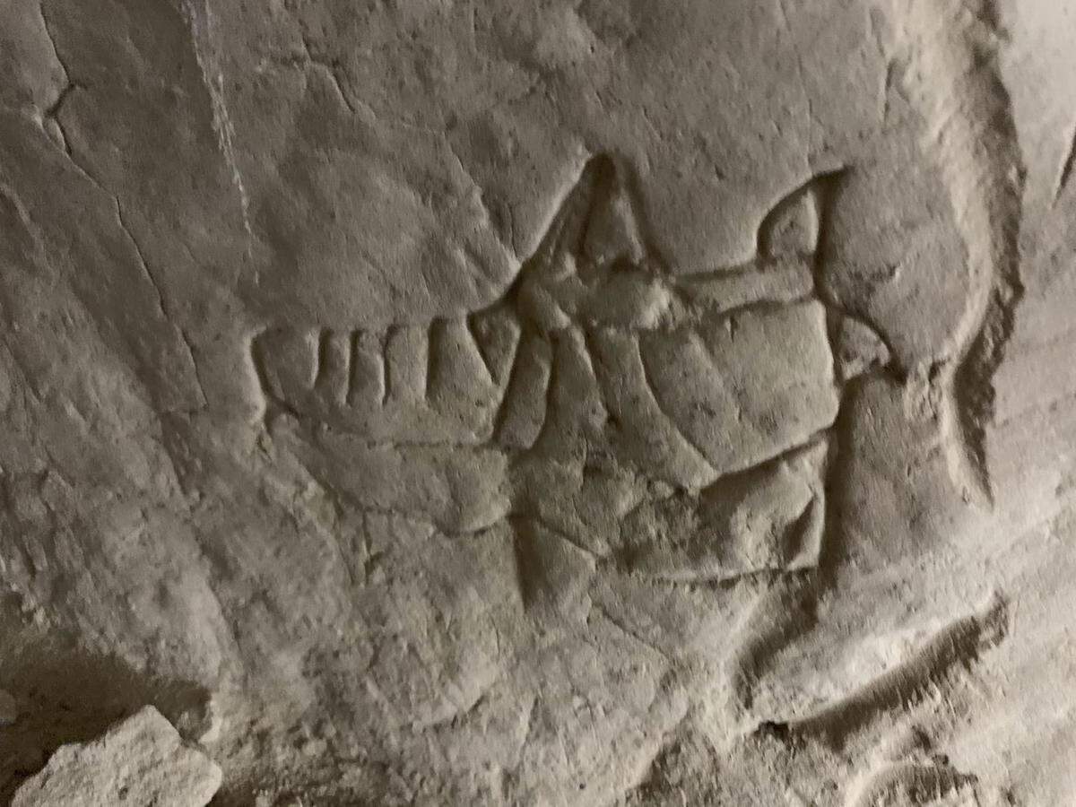 Another carving on the cave wall.