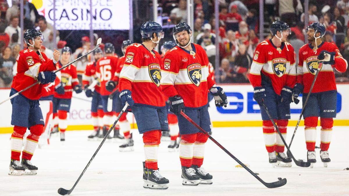 Florida Panthers defenseman Dmitry Kulikov (7) smiles after the game with center Carter Verhaeghe (23) after winning Game 4 of a Stanley Cup playoffs second-round series against the Toronto Maple Leafs on Sunday, May 11, 2025, at Amerant Bank Arena in Sunrise, Fla. The Florida Panthers won 2-0.