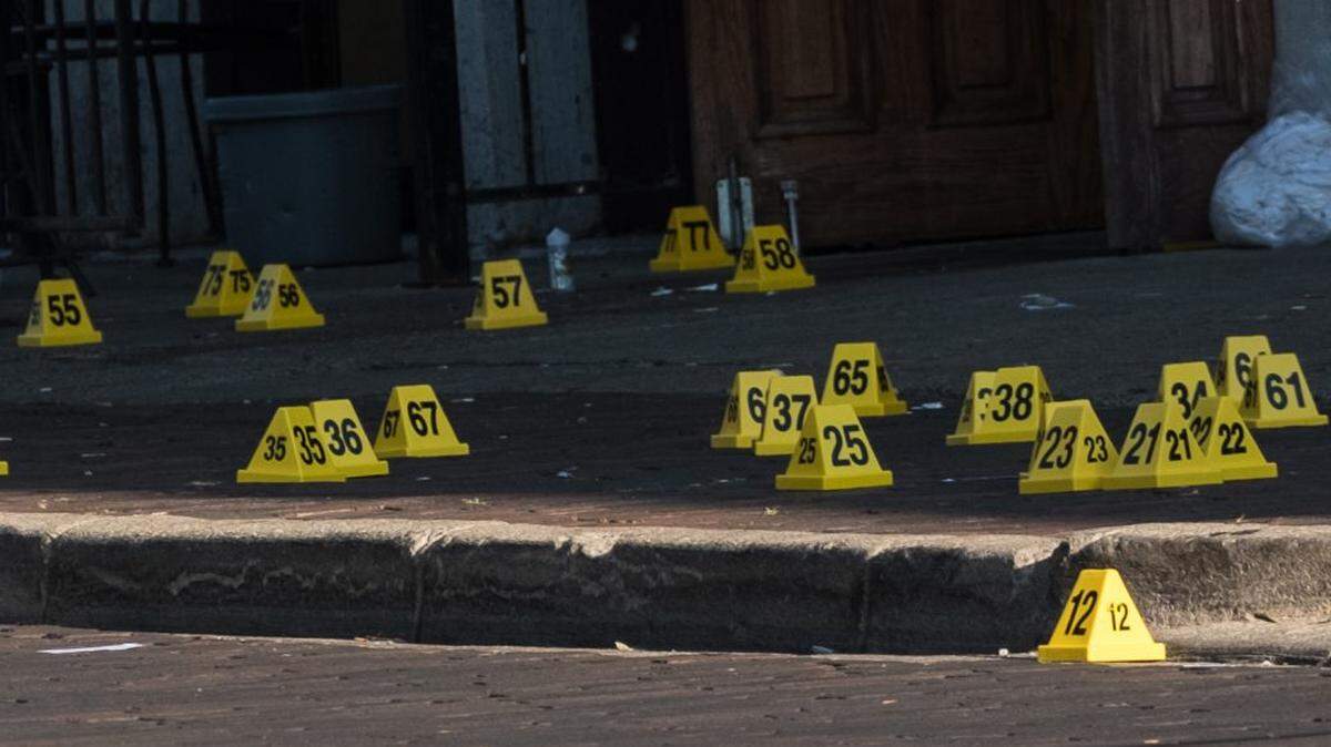 After a shooter opened fire in Dayton, Ohio, on Aug 4, police later marked the location where nine people were killed. 