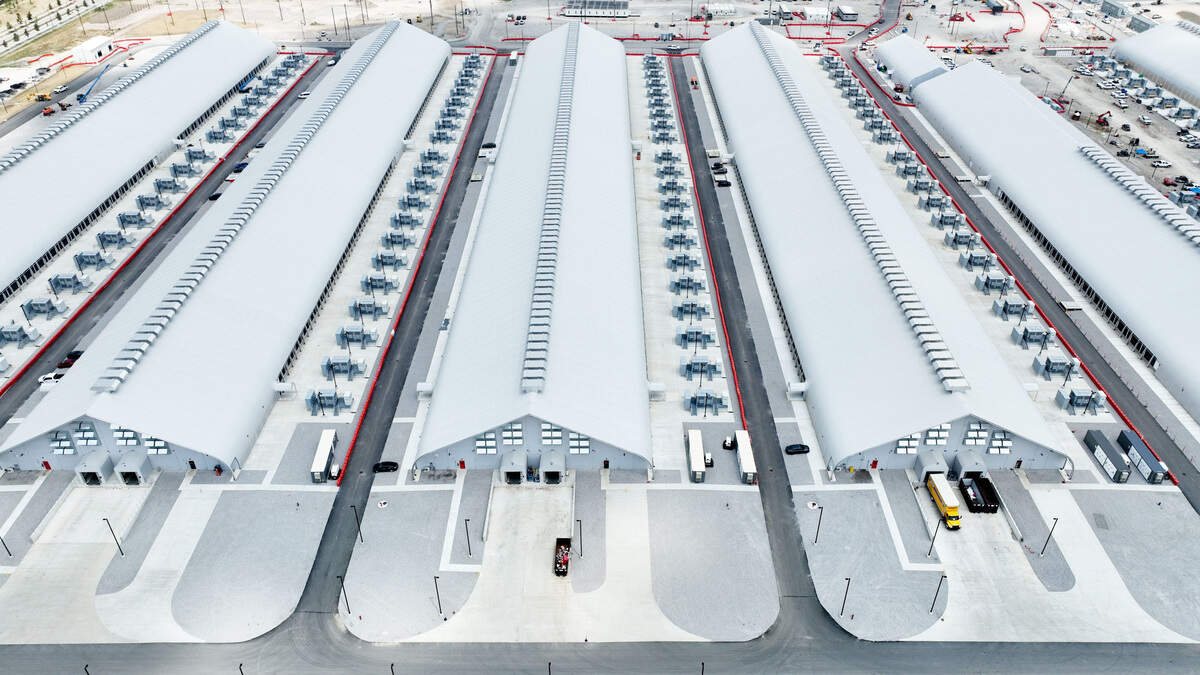Large tent-like structures under construction for Meta’s expanding artificial intelligence data center campus rise above the northeast corner of Morse Road and Beech Road in New Albany, Ohio, on July 31, 2026.