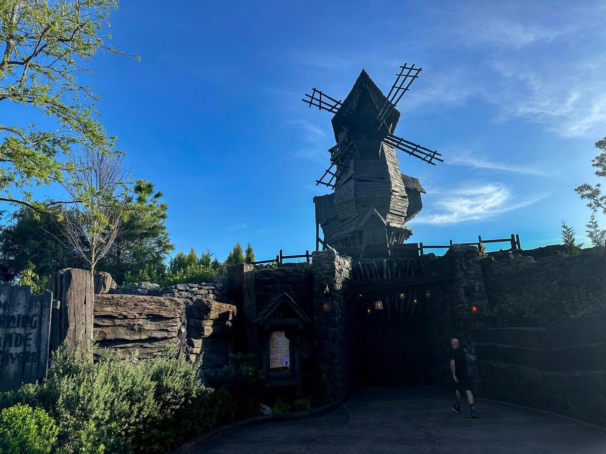 Burning Blade Tavern, inside the Dark Universe world of Universal Epic Universe is a monster hunters’ hangout, complete with the severed heads of creatures behind the bar and a giant windmill outside that periodically catches fire.