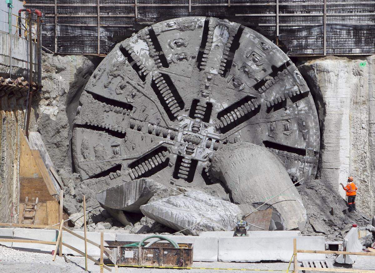 The digging of an under-the-bay tunnel to PortMiami reached a milestone Tuesday when the giant machine completed one half of the journey through Government Cut on Tuesday, July 31, 2012.