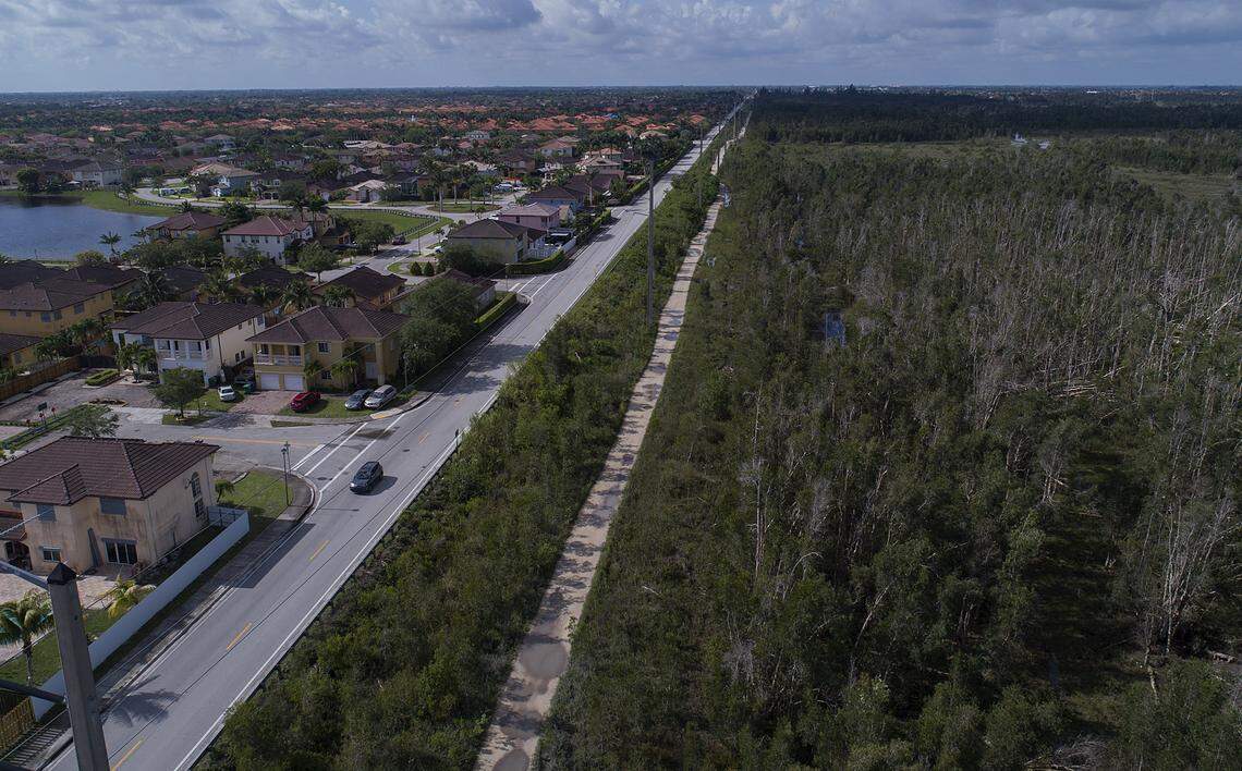 Miami-Dade County transportation planners want to extend the Dolphin Expressway beyond the urban boundary shown here along Southwest 157th Avenue.