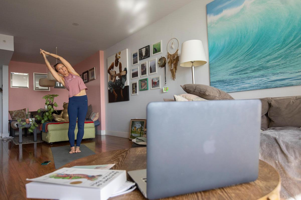 Jenny Sanchez has shifted to teaching live-stream yoga classes from her home since her Santuario Miami studio was closed because of coronavirus concerns.
