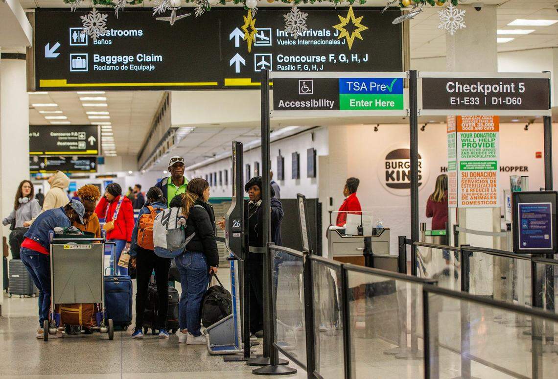 Travelers enter checkpoint 5 at the Miami airport.