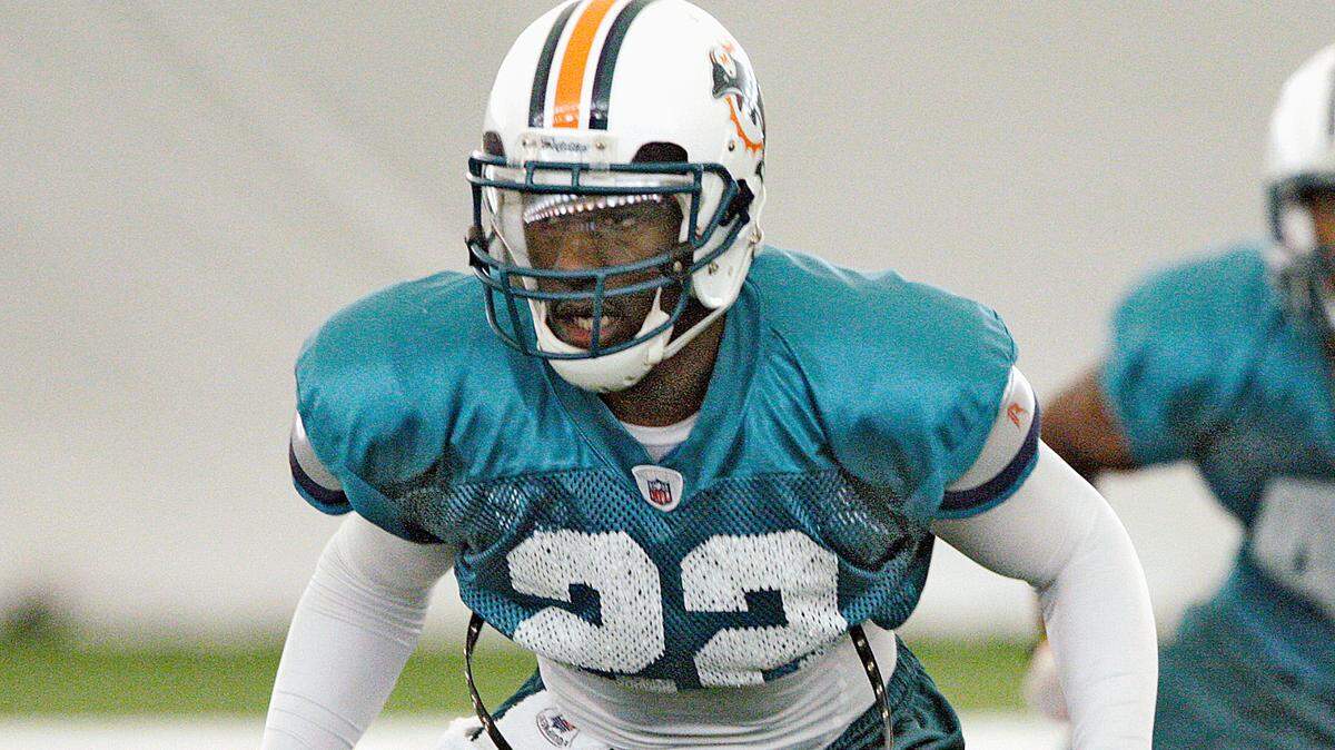 In 2008, cornerback Michael Lehan (22) works out during Miami Dolphins practice inside the protected bubble field house in Davie.