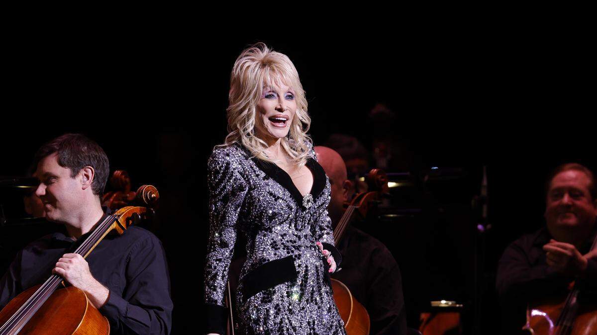 Dolly Parton speaks onstage at Dolly Parton’s Threads: My Songs In Symphony World Premiere at Schermerhorn Symphony Center on March 20, 2025.