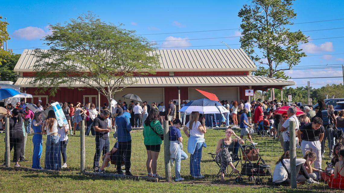 Customers line up at the new Knaus Berry Farm on the opening day of the season on Dec. 22, 2025.