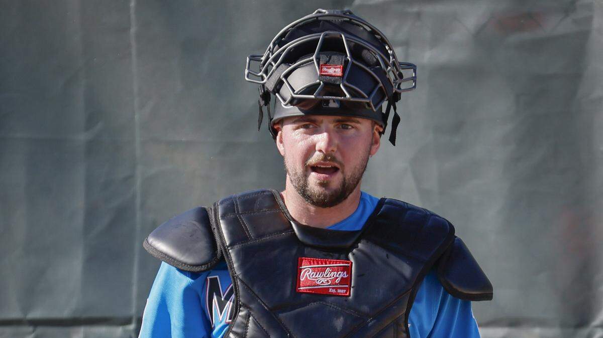 Miami Marlins catcher Liam Hicks (34) arrives for the first day of spring training at Roger Dean Chevrolet Stadium in Jupiter, Florida on Wednesday, February 11, 2026 