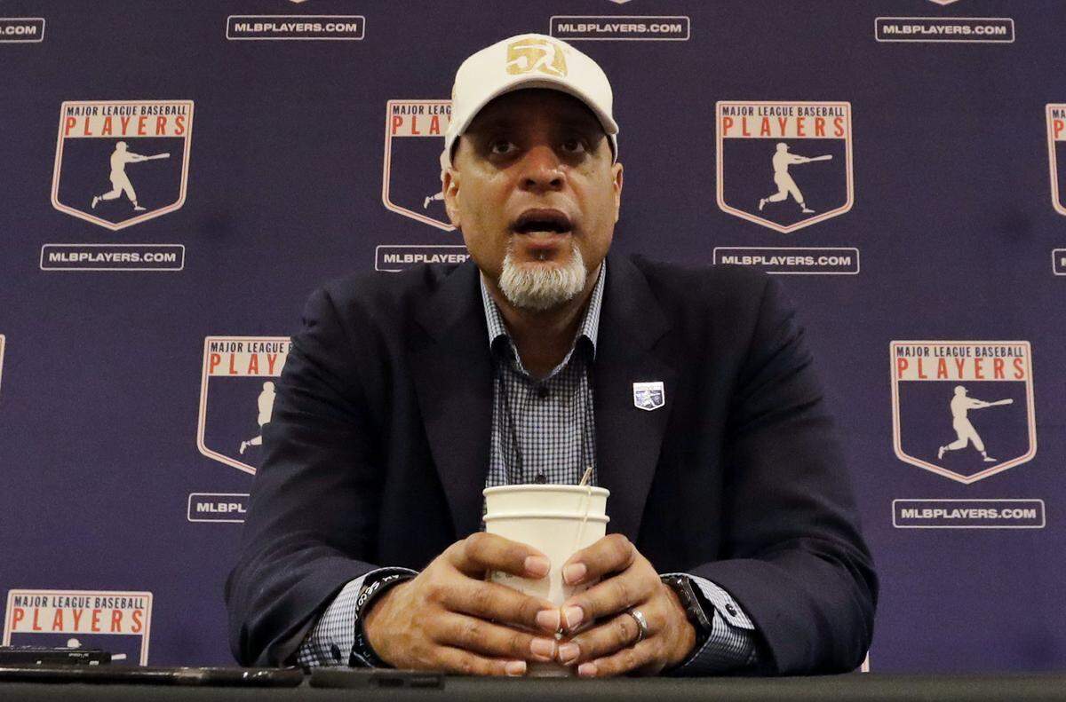 In this Feb. 19, 2017, file photo, Tony Clark, executive director of the Major League Players Association, answers questions at a news conference in Phoenix.