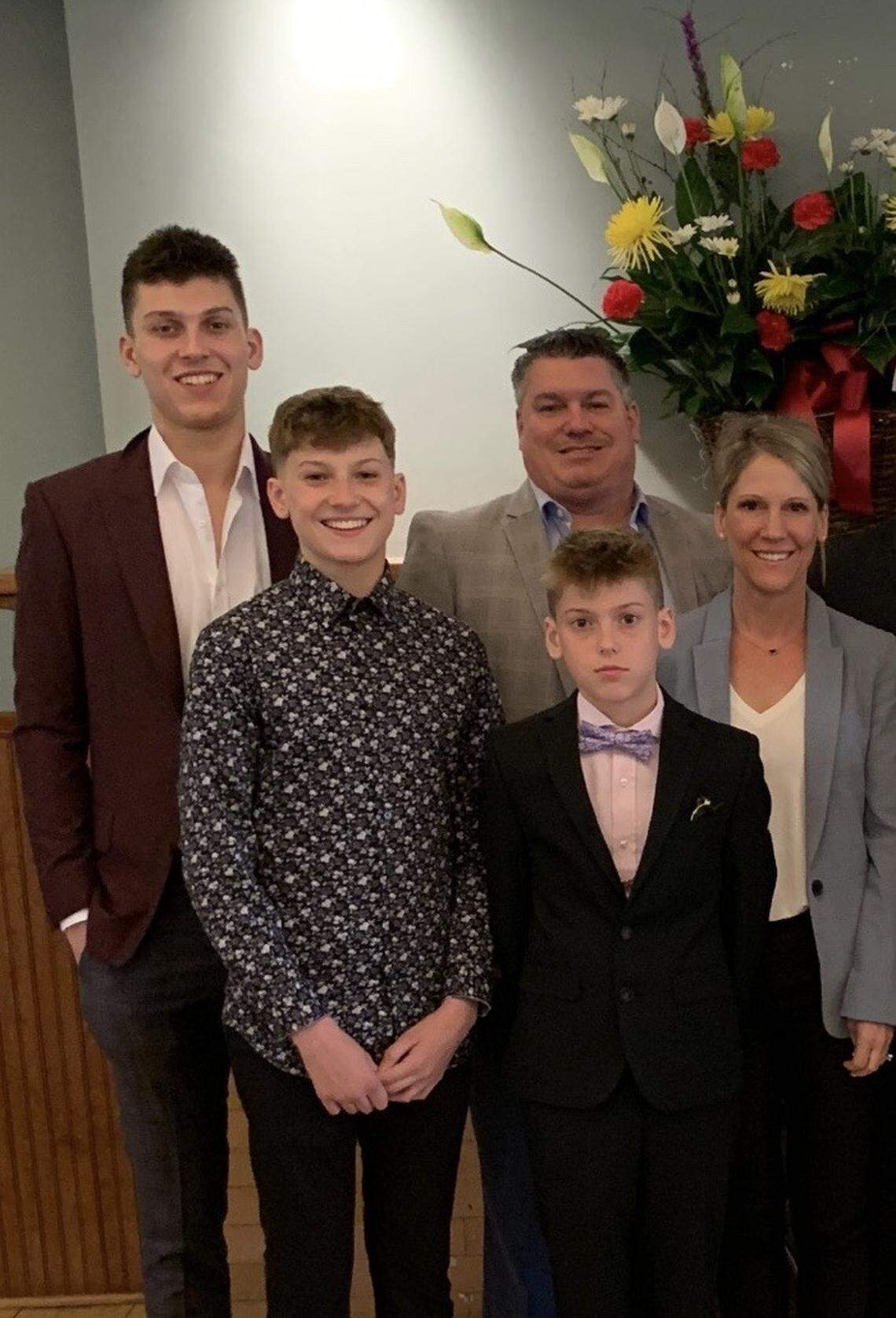 A family photo of Heat rookie Tyler Herro, his father Chris Herro, his mother Jennifer Herro, and his brothers Austin Herro and Myles Herro.