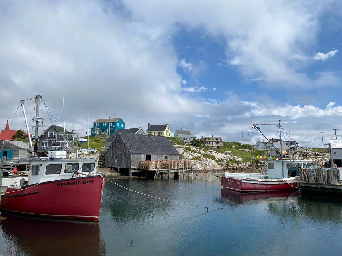 Canadian destinations like Peggy’s Cove, Nova Scotia, are seeing an uptick in visits from U.S. travelers this summer.