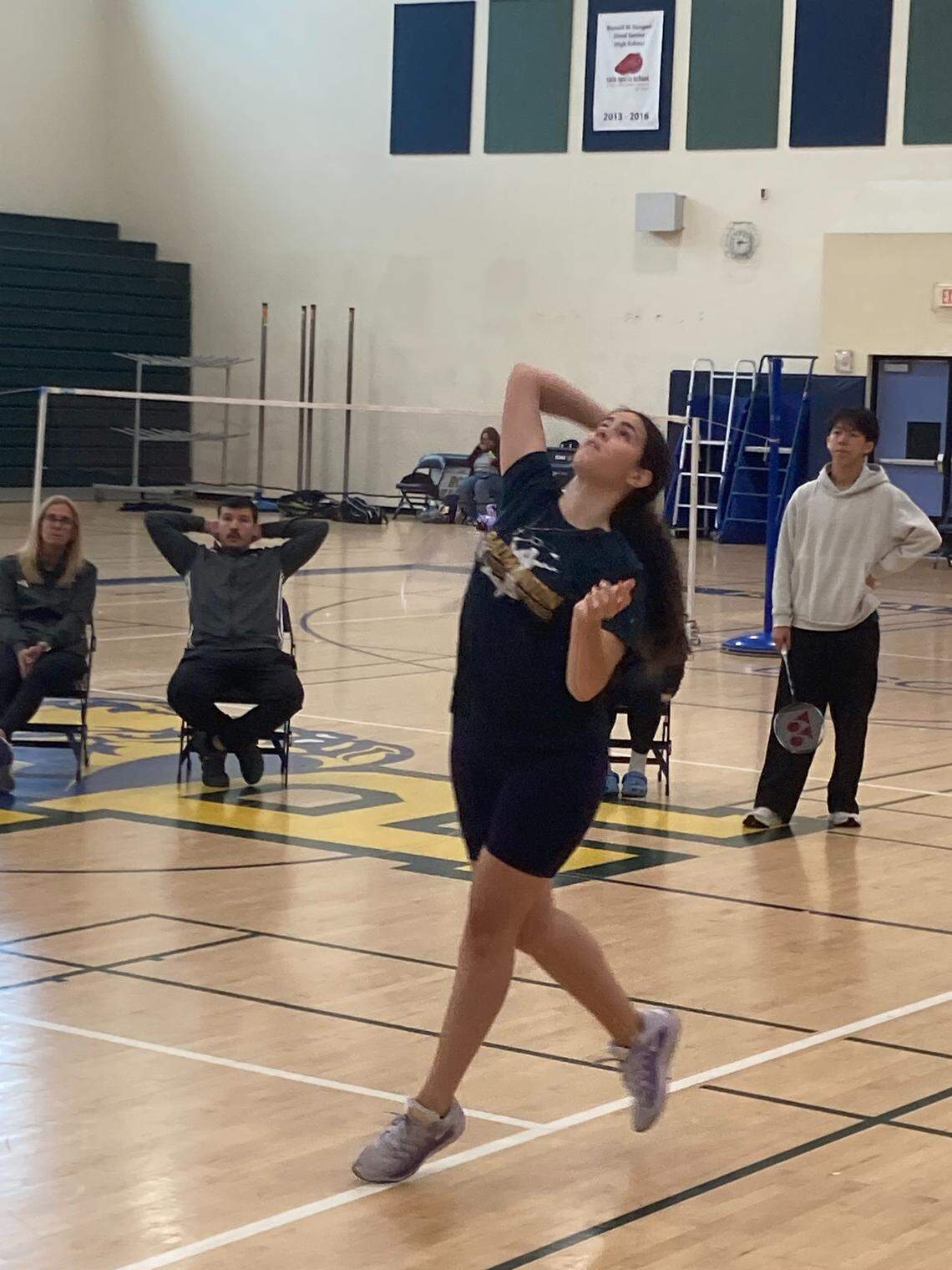 Coral Park’s Aaliyah Soto swings her racket during a match on Wednesday in the girls’ singles division of the GMAC badminton championship at Reagan High in Doral, Fla.