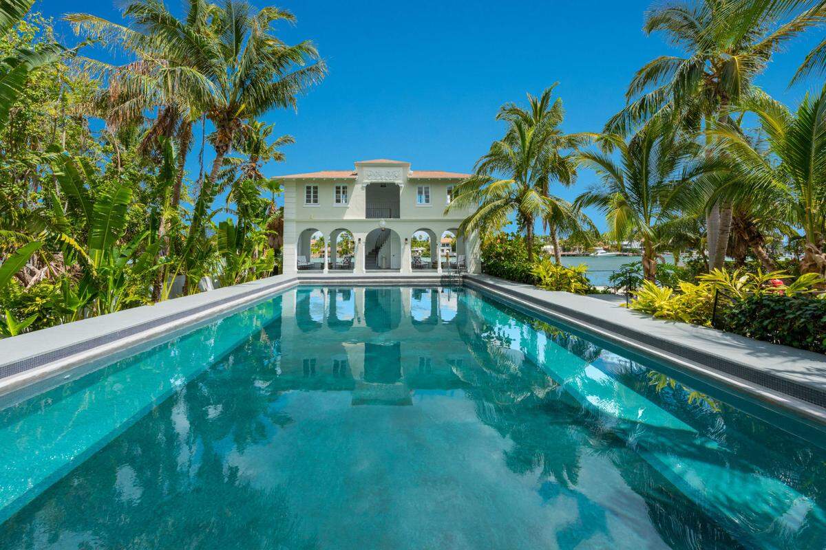 Todd Michael Glaser and Nelson Gonzalez sold Al Capone’s former Miami Beach home, with this 60-foot pool and guest house, after facing backlash regarding their redevelopment plans.