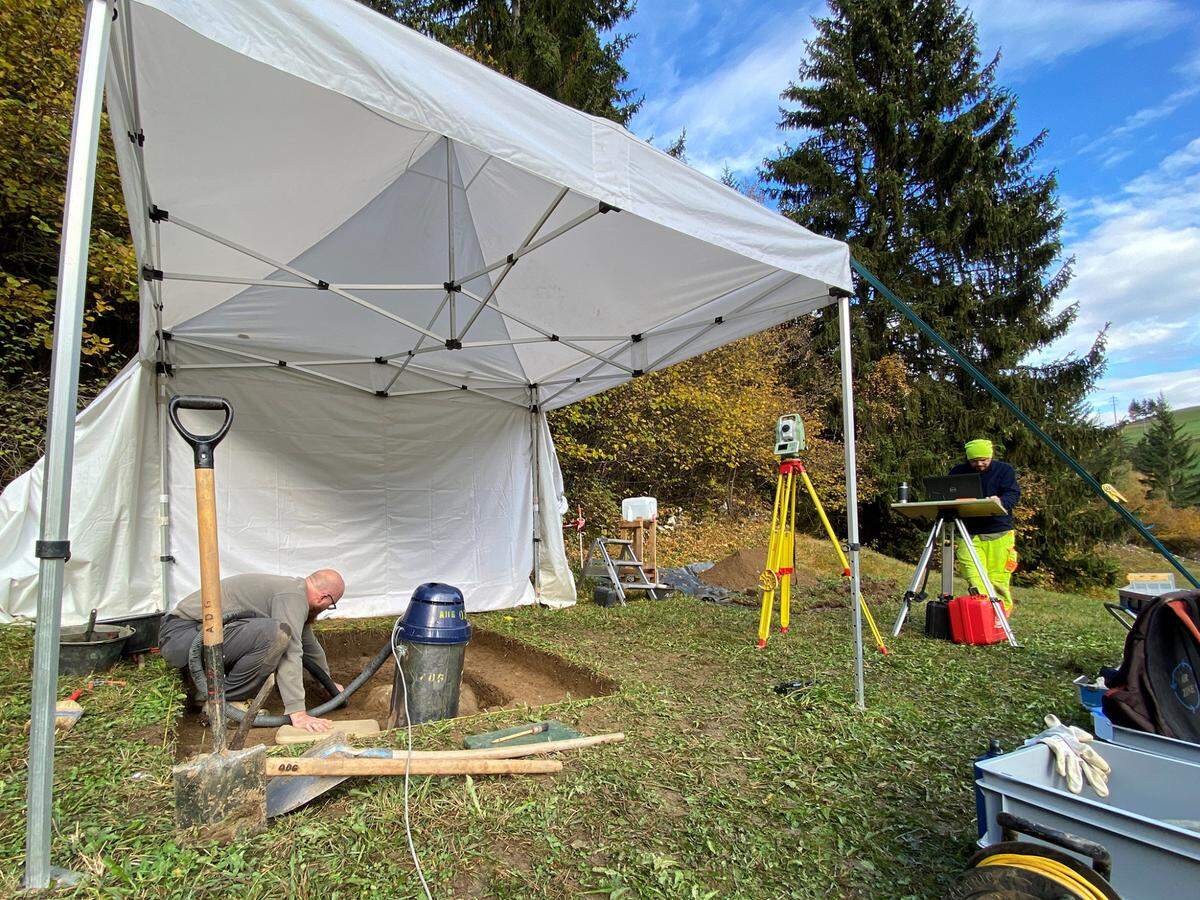 Archaeologists excavate the buried treasure.