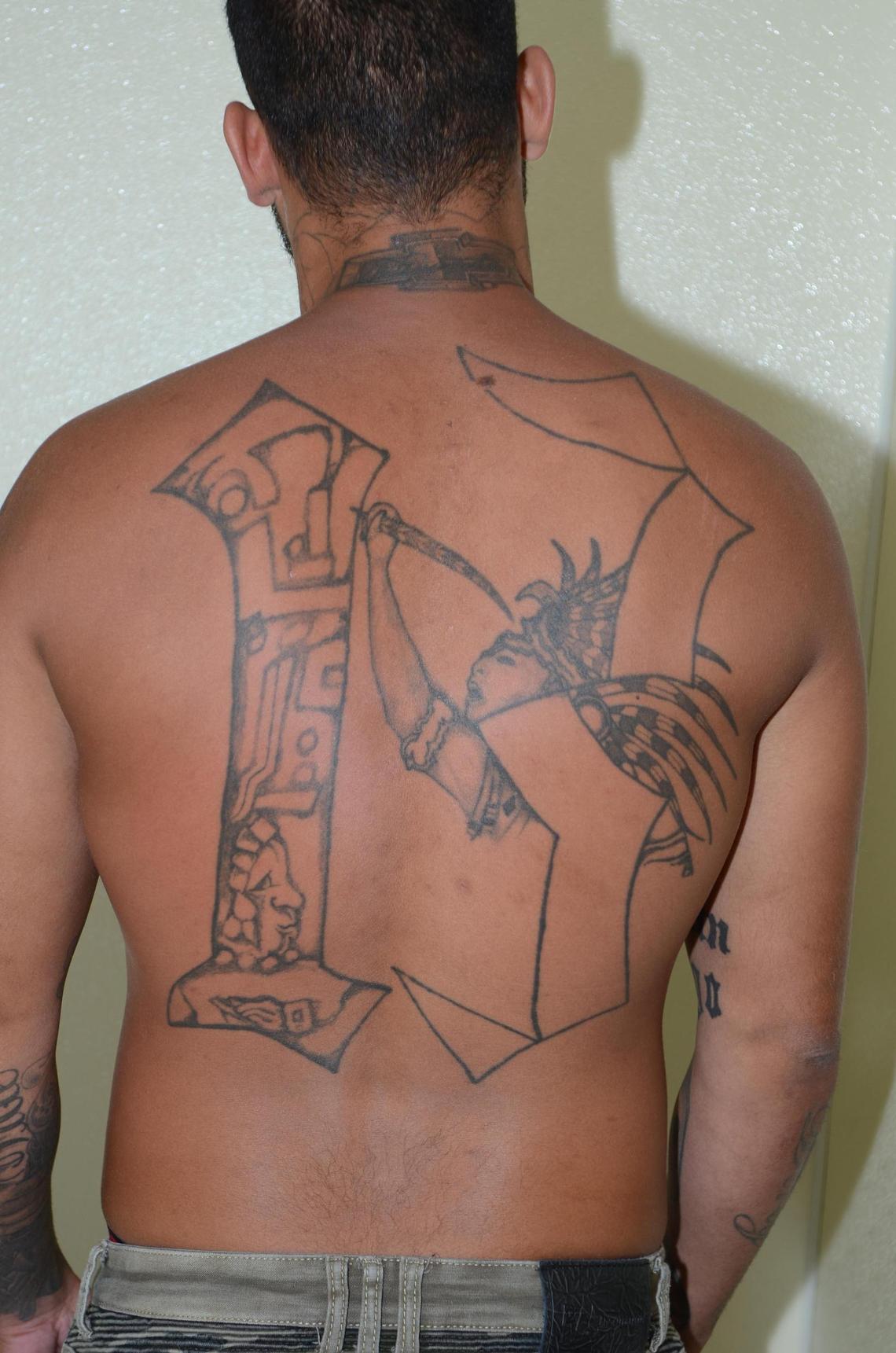 Tattoos on the body of David Paneque, 29, who is accused of a vicious murder in Miami-Dade County.