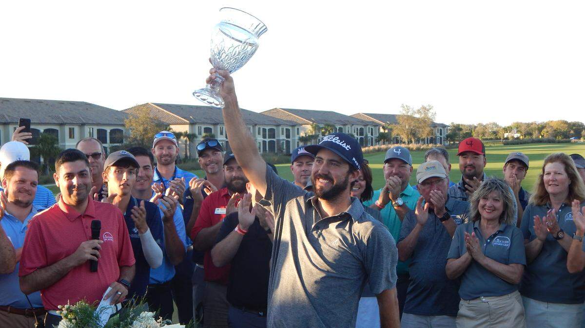 Denver native Mark Hubbard holds up the LECOM Suncoast Classic trophy after winning his first Web.com Tour event in 2019 at Lakewood National Golf Club. Hubbard shot 26-under par 262 for the 72-hole tournament for a two-shot victory over former Stanford star Maverick McNealy.