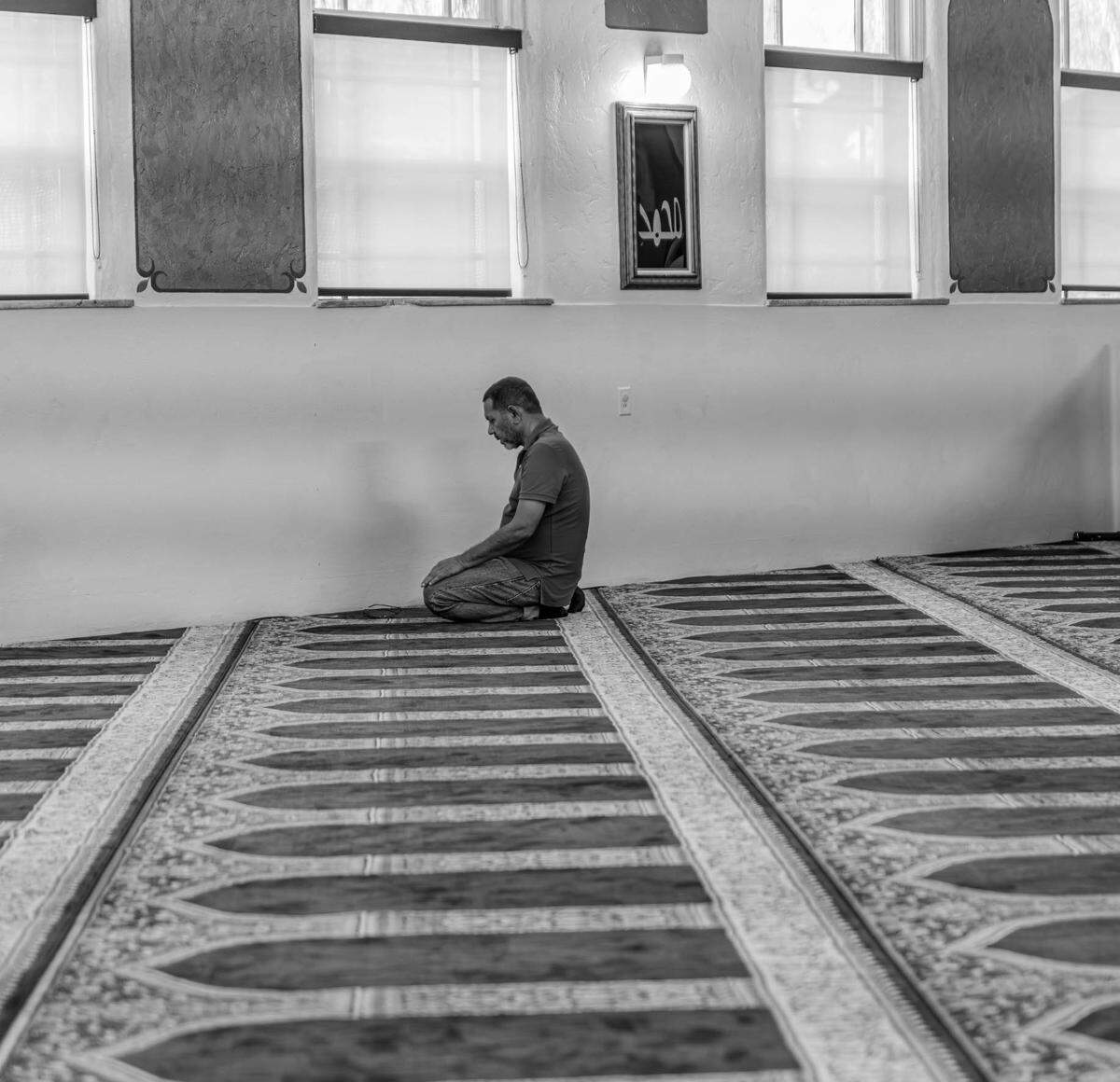 A Muslim man prays at Masjid Al-Ansar, South Florida’s oldest mosque. The image was shot by Little Haiti photographer, Woosler Delisfort, and is a part of his new show called “SANCTUARY: Our Sacred Place,” which showcases the religious origins of Afro-Caribbeans populations in Miami.