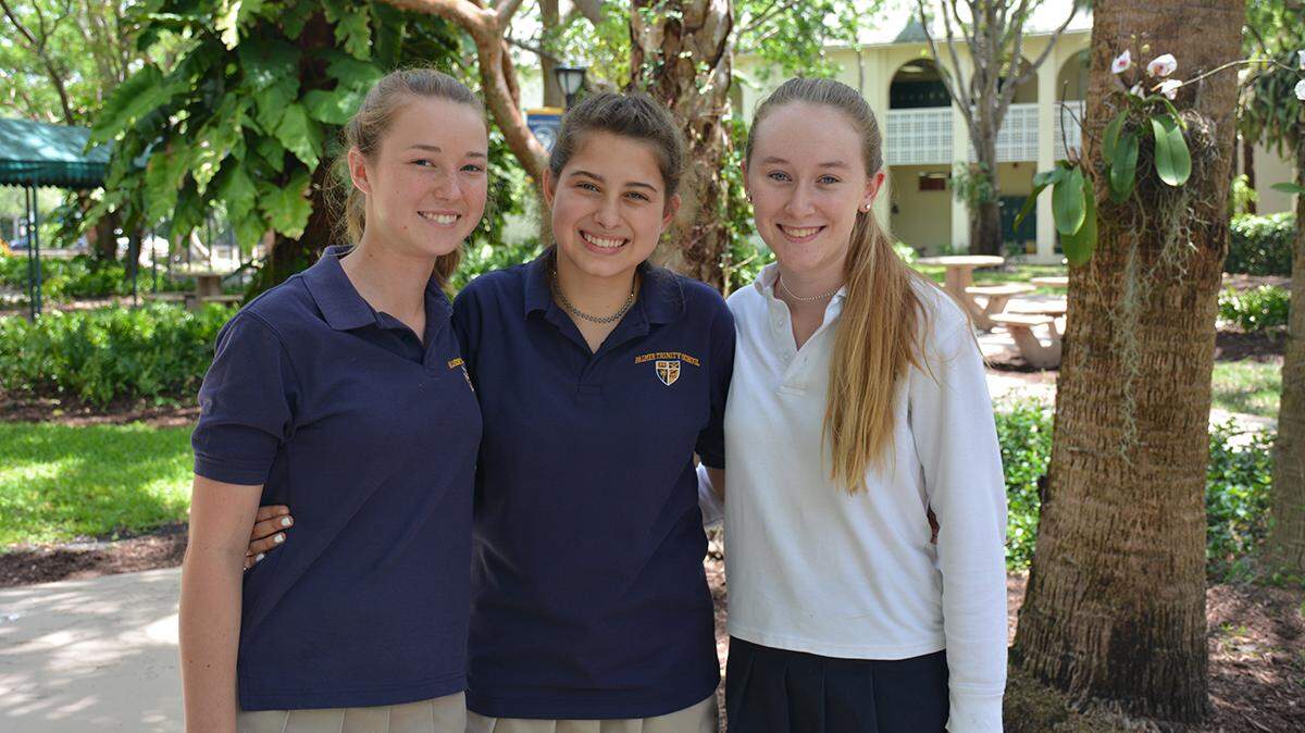 Palmer Trinity School students Megan Keller, left, Olivia Bacardi and Attie Crews are the founders of One Change Bracelets, an organization created to raise awareness about skin cancer prevention. To date, the students have donated $20,000 to cancer research.