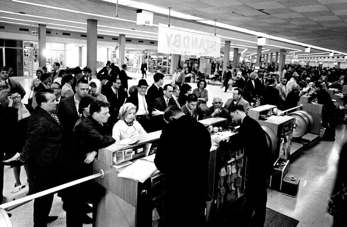 Passengers try to get a flight at MIA in 1966.