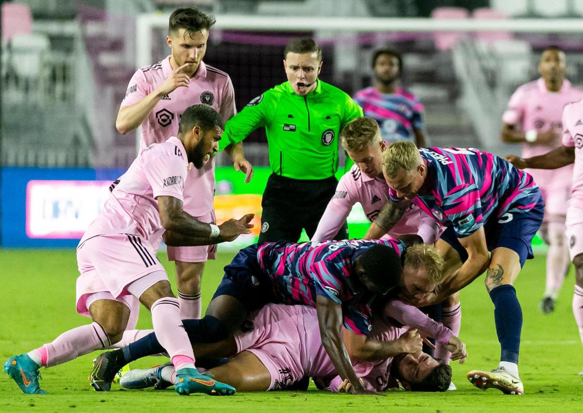 Inter Miami CF forward Robbie Robinson (19) gets into a fight with Tormenta FC defender Jake Dengler (25) during the second half of their U.S. Open Cup soccer match at DRV PNK Stadium on Tuesday, May 10, 2022, in Fort Lauderdale, Florida.