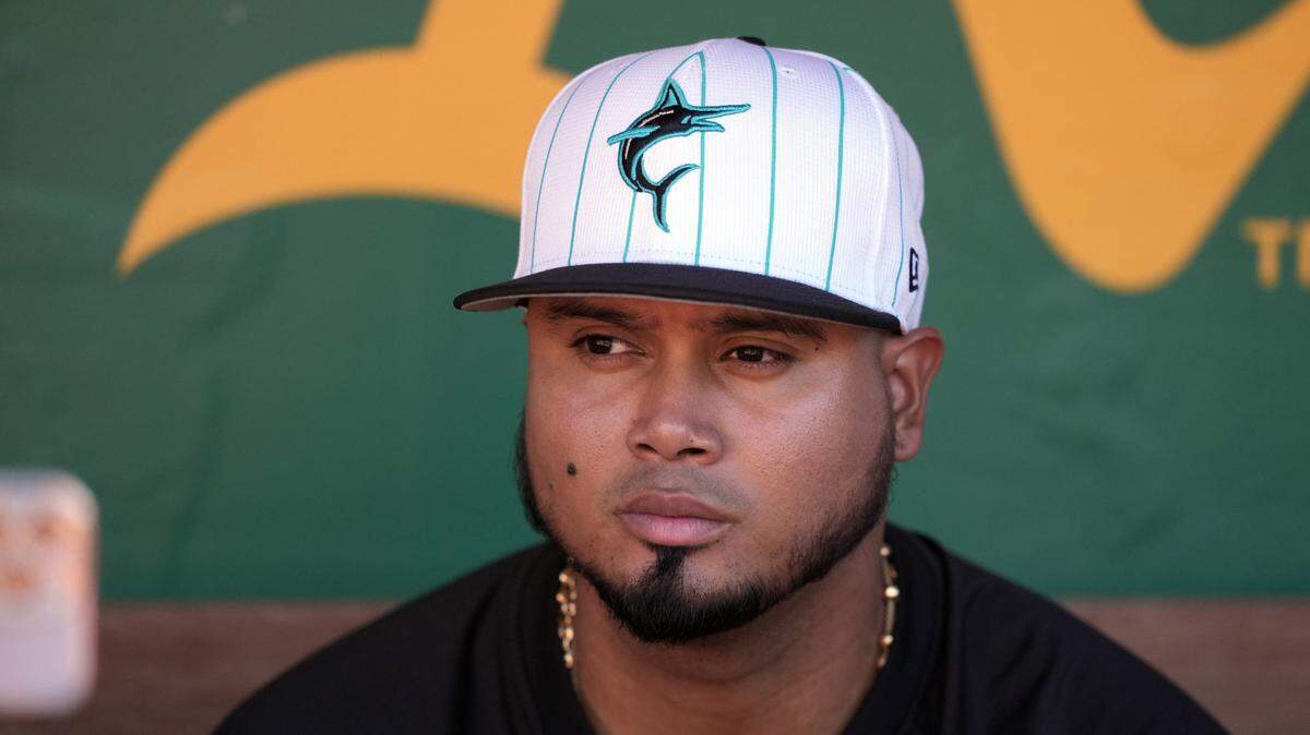 May 3, 2024; Oakland, California, USA; Miami Marlins second baseman Luis Arraez (3) sits in the dugout before the game against the Oakland Athletics at Oakland-Alameda County Coliseum.