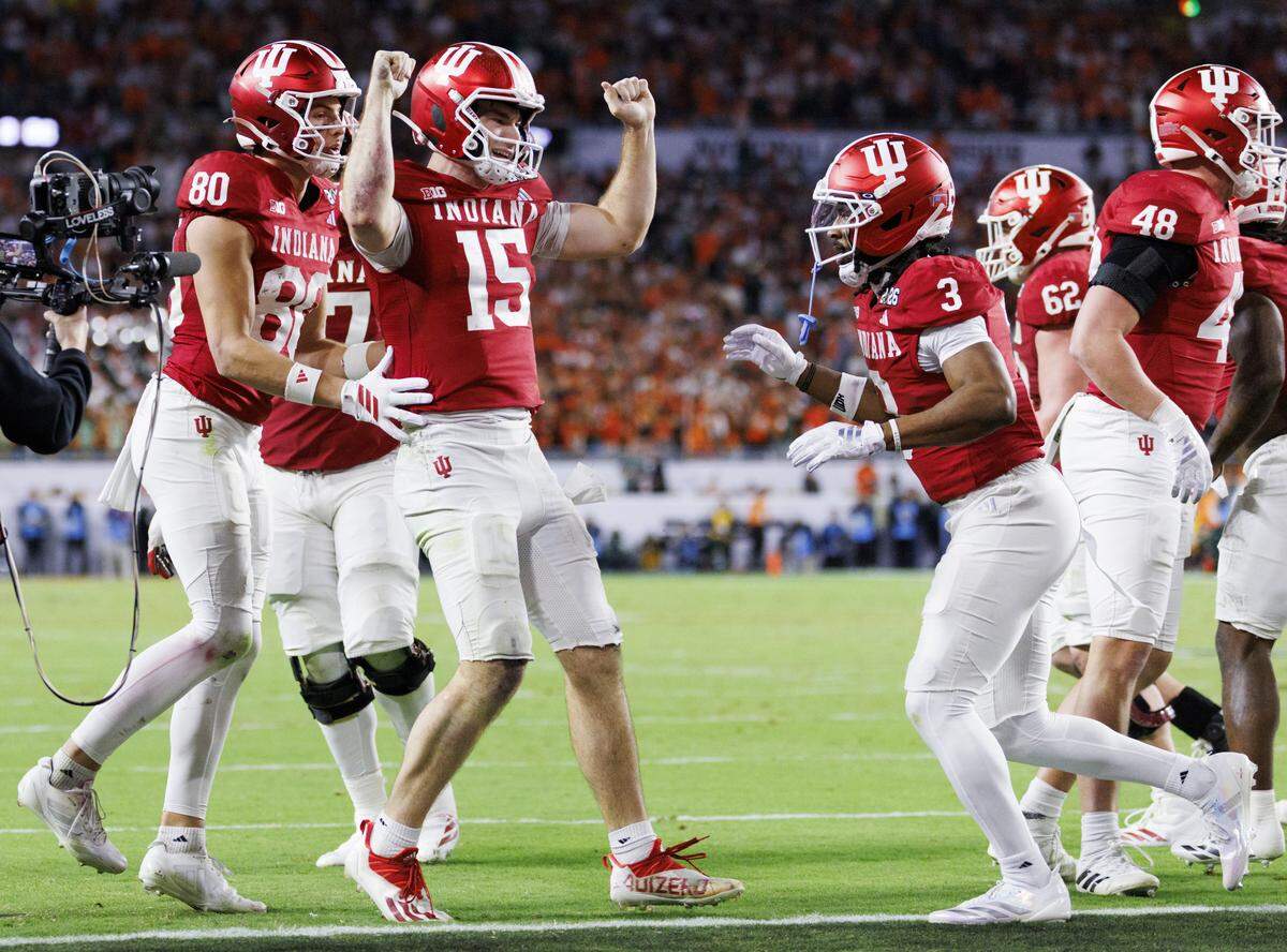 Indiana Hoosiers quarterback Fernando Mendoza (15) reacts to scoring a touchdown during the second half of the College Football Playoff National Championship Game against the Miami Hurricanes at Hard Rock Stadium on Monday, Jan. 19, 2026 in Miami Gardens, Fla.