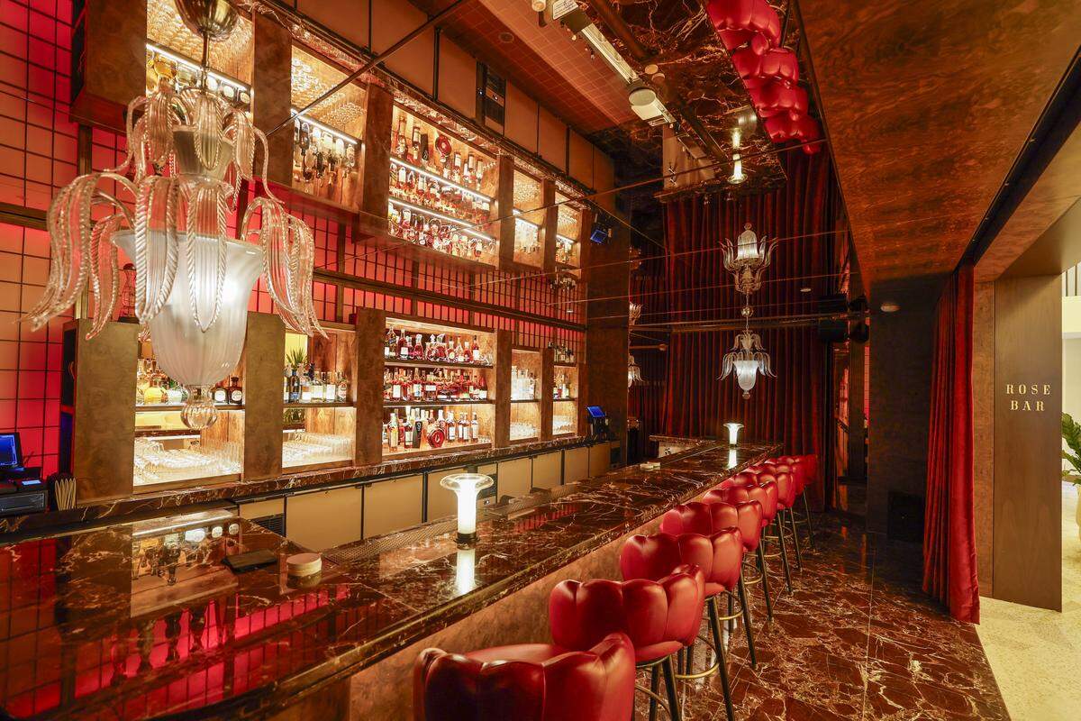 The reimagined Rose Bar at Delano Miami Beach, with Murano glass Narciso chandeliers that have been fully restored to their original condition.