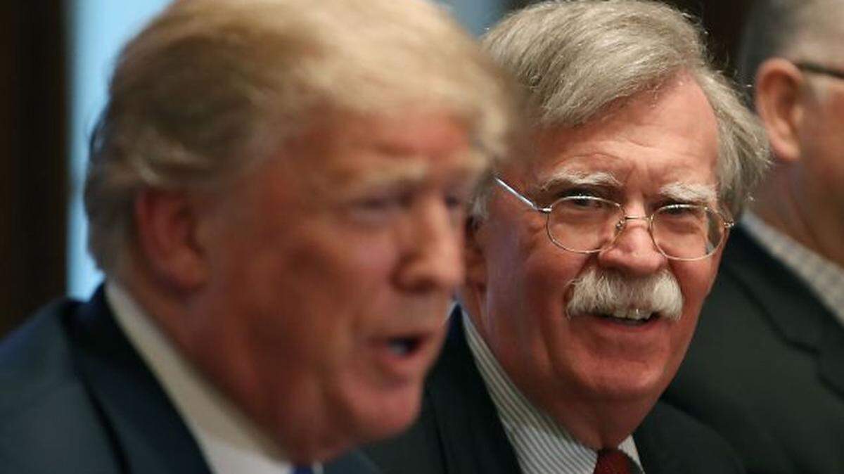 President Trump is reported to have joked that if National Security Adviser John Bolton, right, had his way, “We’d be in four wars by now.”