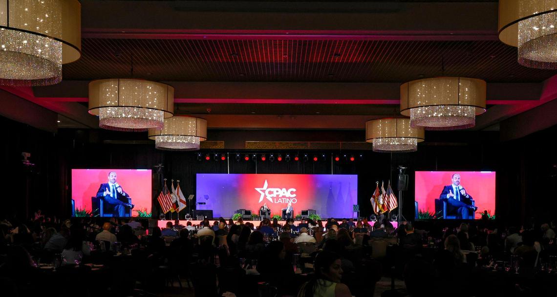 Eduardo Bolsonaro, Brazilian lawyer, activist and politician, speaks as CPAC Chairman & former White House political director Matt Schlapp listens during CPAC Latino 2025 at Seminole Hard Rock Hotel & Casino Hollywood, Florida, on Saturday, June 28, 2025.