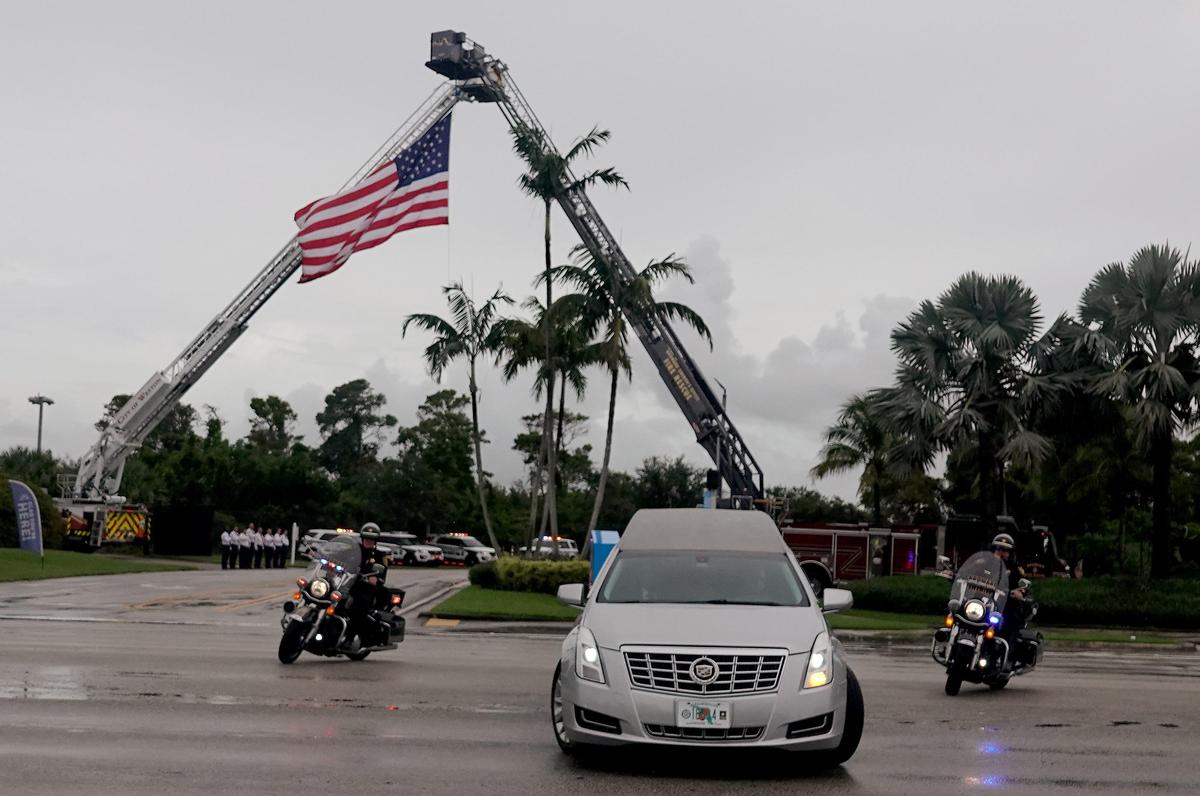The hearse carrying the remains of Broward Sheriff’s Office Deputy Benjamin Nimtz arrives at Calvary Chapel in Fort Lauderdale on Aug. 1, 2019.
