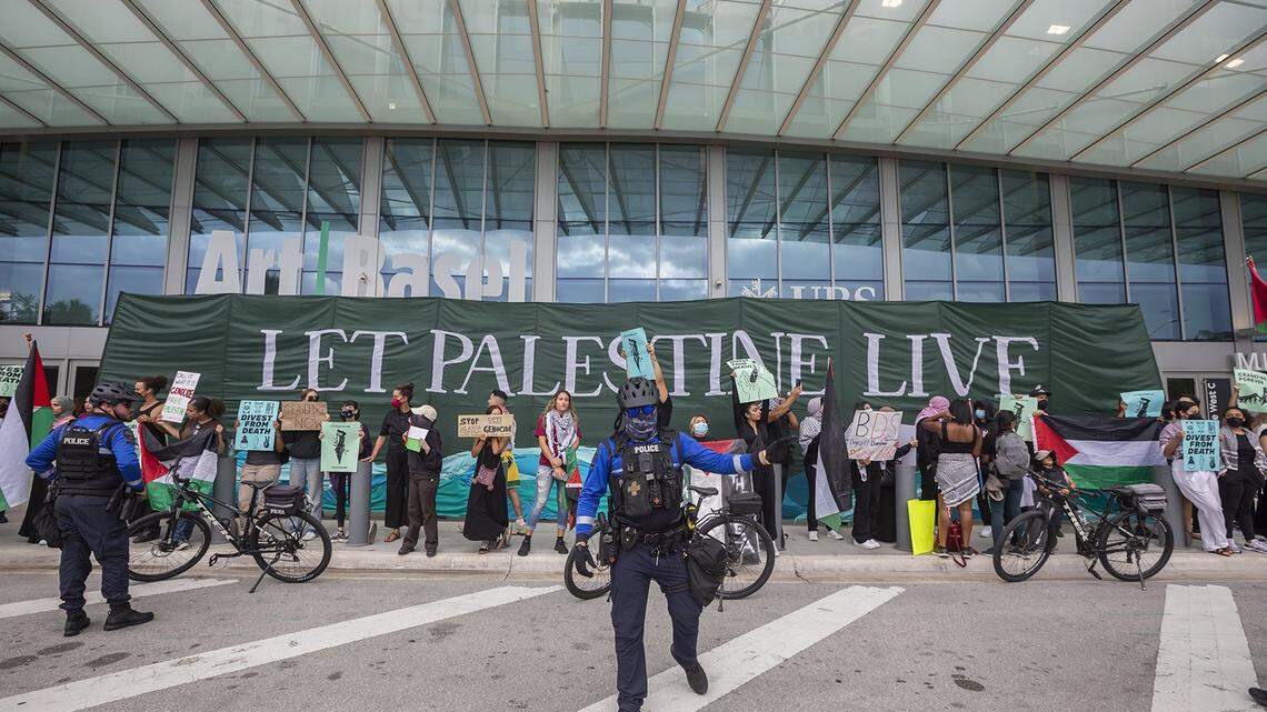 Artists and activists protest in front of Art Basel Miami Beach against the war in Gaza on Dec. 8, 2023.