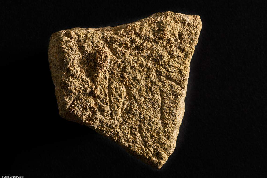 The stone with a carving of a vulva.