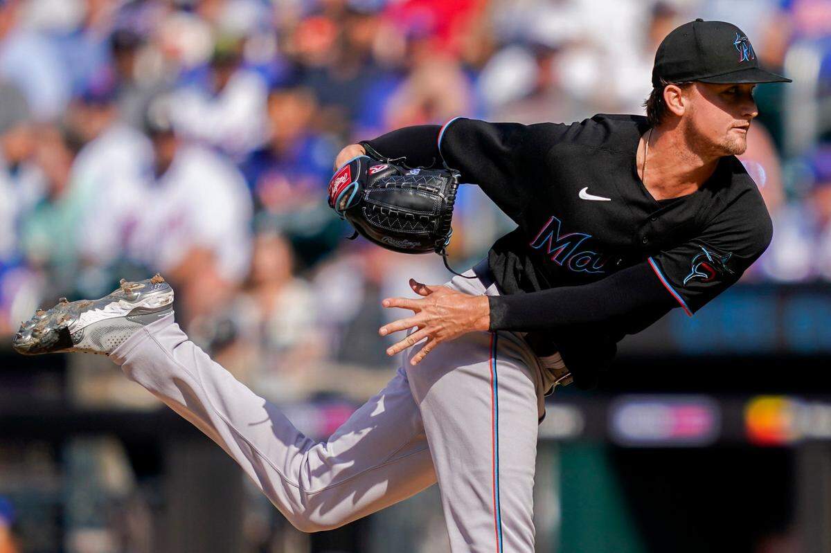 Miami Marlins starting pitcher Braxton Garrett (60) throws in the first inning of a baseball game against the New York Mets, Saturday, July 9, 2022, in New York. (AP Photo/John Minchillo)