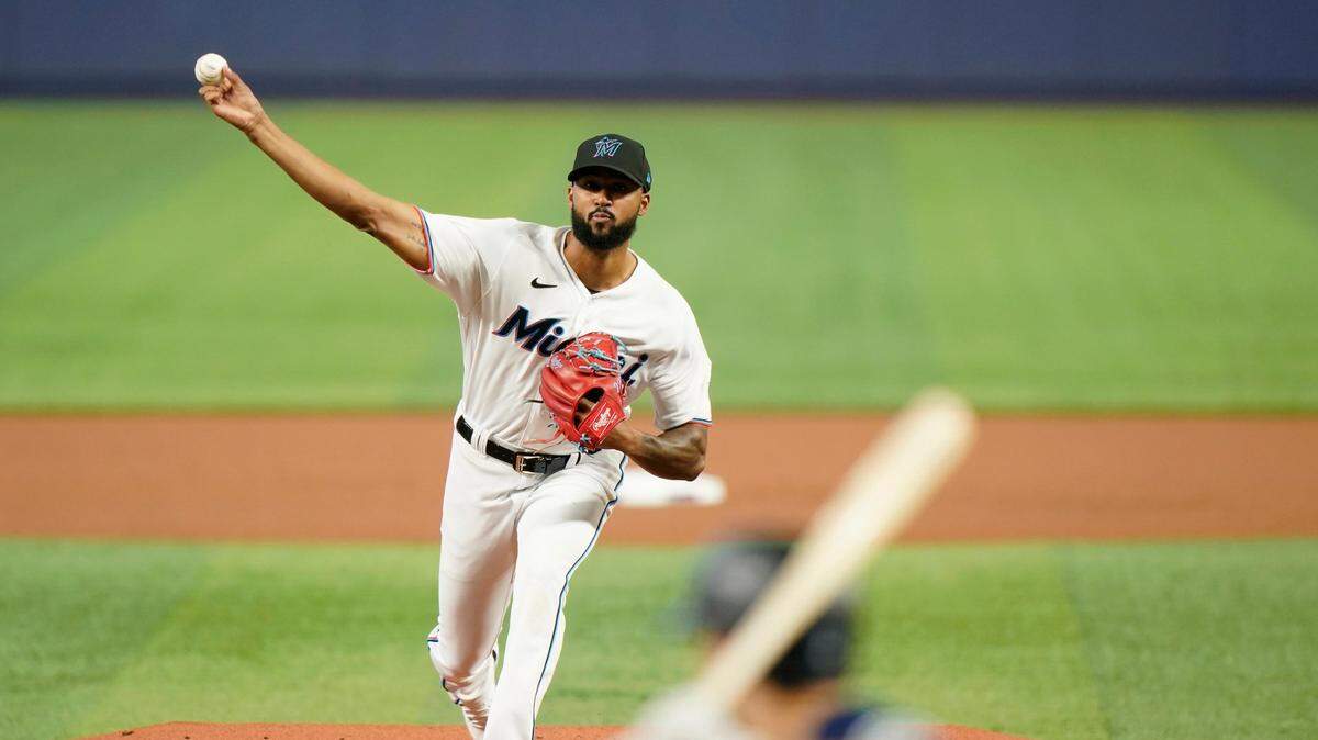 Miami Marlins’ Sandy Alcantara pitches to Seattle Mariners’ Adam Frazier during the first inning of a baseball game, Sunday, May 1, 2022, in Miami.