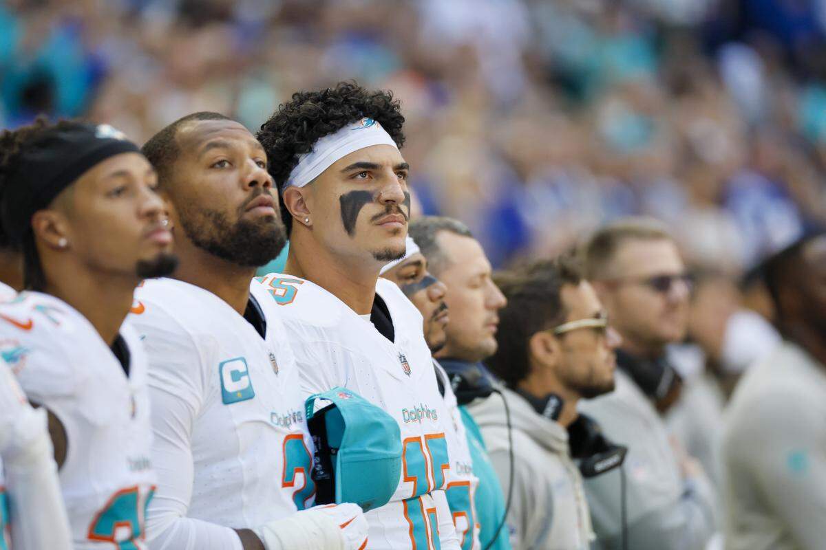 Miami Dolphins linebacker Jaelan Phillips (15) looks on during the national anthem before an NFL game against the Indianapolis Colts at Lucas Oil Stadium on Sunday, Sept. 7, 2025, Indianapolis, Indiana.